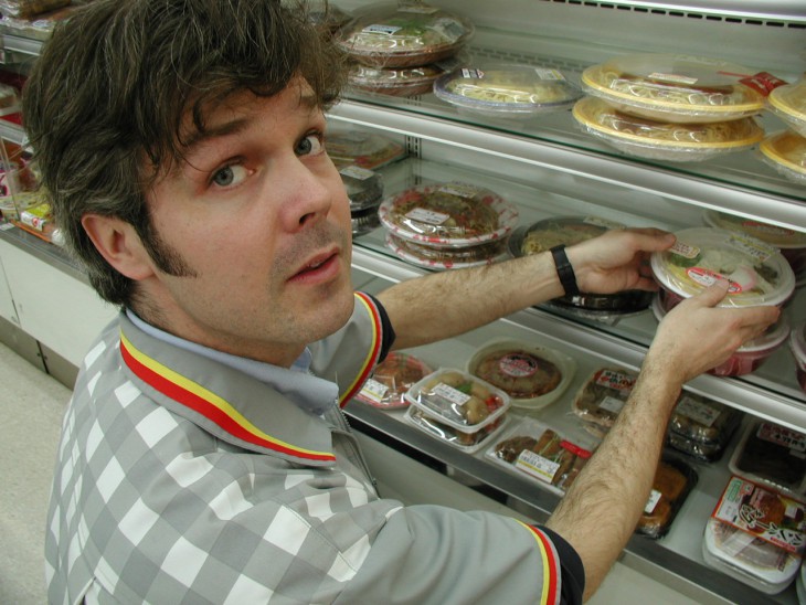 Gavin Whitelaw stocking obento while conducting research as a konbini clerk. PHOTO: COURTESY OF GAVIN H. WHITELAW